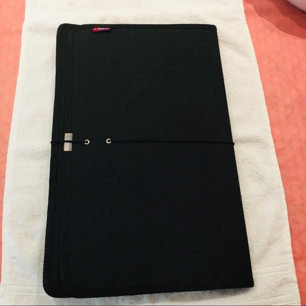 Portfolio legal size in black material. NWOT